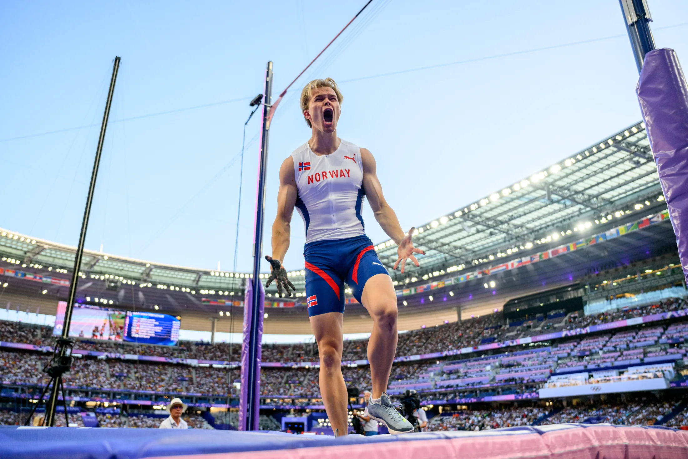 Sondre Guttormsen celebrating a vault at the Paris 2024 Olympic Games